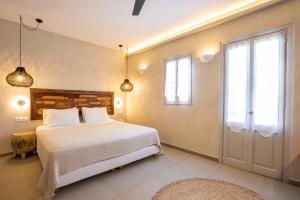 Aegean Village Beachfront Resort客房内的一张或多张床位