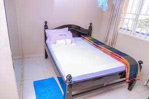 Postel nebo postele na pokoji v ubytování Precise Motel