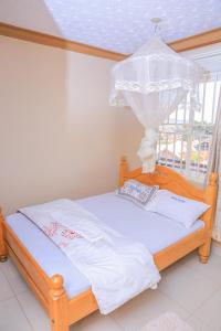 Ein Bett oder Betten in einem Zimmer der Unterkunft Precise Motel