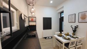 Televízia a/alebo spoločenská miestnosť v ubytovaní CS14 Silver Apartment