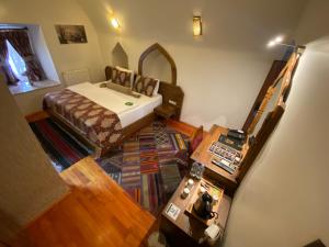 Postel nebo postele na pokoji v ubytování BEHRAMPAŞA OTEL &CAFE &RESTAURANT
