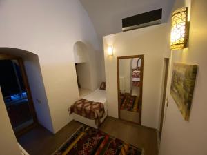Postel nebo postele na pokoji v ubytování BEHRAMPAŞA OTEL &CAFE &RESTAURANT