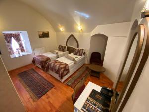 Postel nebo postele na pokoji v ubytování BEHRAMPAŞA OTEL &CAFE &RESTAURANT + 37 fotografií