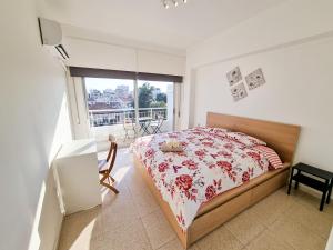 City View Rooms tesisinde bir odada yatak veya yataklar