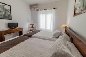 Postel nebo postele na pokoji v ubytování Hotel Las Errizas by Vivere Stays