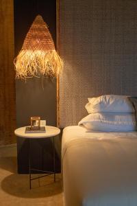Postelja oz. postelje v sobi nastanitve Tava Glamping Cerro