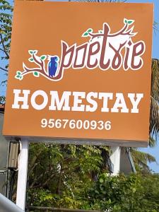a sign for a pepsi home stay at Poetrie Homestay in Ernakulam