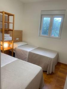 Кровать или кровати в номере Can Carles - Delta del Ebro