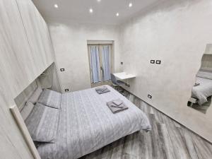 Postel nebo postele na pokoji v ubytování Appartamento in Piazza Vittorio Veneto con parcheggio, Torino