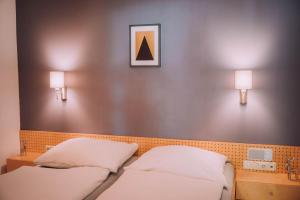 A bed or beds in a room at Apartment Auenfeld Widderstein