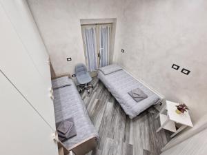 Postel nebo postele na pokoji v ubytování Appartamento in Piazza Vittorio Veneto con parcheggio, Torino