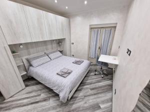 Postel nebo postele na pokoji v ubytování Appartamento in Piazza Vittorio Veneto con parcheggio, Torino