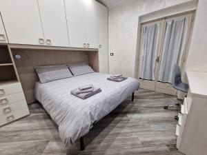 Postel nebo postele na pokoji v ubytování Appartamento in Piazza Vittorio Veneto con parcheggio, Torino
