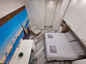 TV a/nebo společenská místnost v ubytování Appartamento in Piazza Vittorio Veneto con parcheggio, Torino