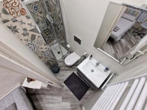 Koupelna v ubytování Appartamento in Piazza Vittorio Veneto con parcheggio, Torino + 37 fotografií