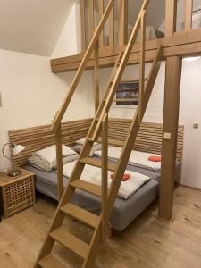 Postel nebo postele na pokoji v ubytování Penzion Stanice lyžařů Fryšava