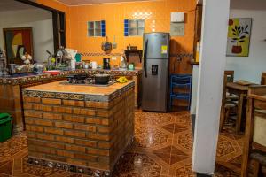 Kuchyň nebo kuchyňský kout v ubytování CAFE RACER HOSTEL + 30 fotografií