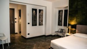Postel nebo postele na pokoji v ubytování Hotel Up Wellness & Spa