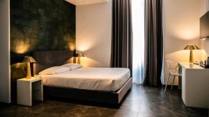 Postel nebo postele na pokoji v ubytování Hotel Up Wellness & Spa