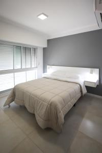 Ліжко або ліжка в номері Departamento de un dormitorio - JUJUY