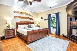 a bedroom with a bed and a fireplace at Island Nest in Charleston