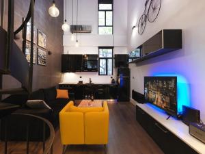 Televízia a/alebo spoločenská miestnosť v ubytovaní 200 Mb fibre remote workers' Dreamhouse + 6 fotografií