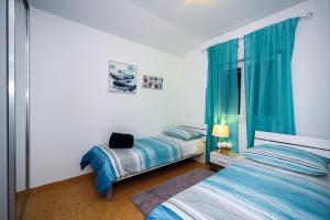 Posteľ alebo postele v izbe v ubytovaní Villa Vruja