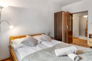 Posteľ alebo postele v izbe v ubytovaní Apartament Rema w centrum APARTZAKOP