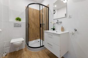 Kúpeľňa v ubytovaní Apartament Rema w centrum APARTZAKOP