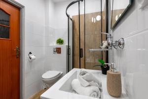 Kúpeľňa v ubytovaní Apartament Rema w centrum APARTZAKOP