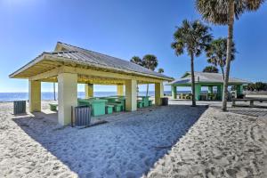 a gazebo on the beach with palm trees at Keaton Beach Escape with Hot Tub 2 Mi to Shore in Perry