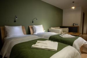 Voodi või voodid majutusasutuse Hotel 1700 toas