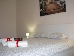 Кровать или кровати в номере 4You Apartament