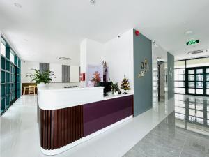 a lobby of a hospital with a reception counter at Myrtle Boutique Hotel Phu Quoc in Phu Quoc +41 photos
