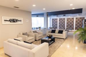 TV a/nebo společenská místnost v ubytování Hotel Can Pamplona