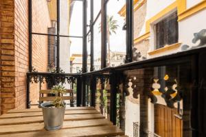 A balcony or terrace at Apartamento DUX VERAGUA Centro Sevilla