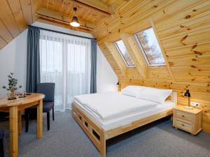 Posteľ alebo postele v izbe v ubytovaní Villa Taternik by Golden Apartments