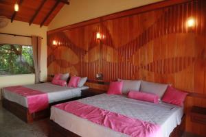 Postel nebo postele na pokoji v ubytování Horizon KiteSurfing Beach Resort