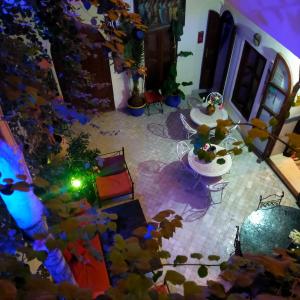 an aerial view of a living room with two tables at Riad white flowers in Marrakesh