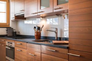 Kuchyň nebo kuchyňský kout v ubytování Apartment Montana