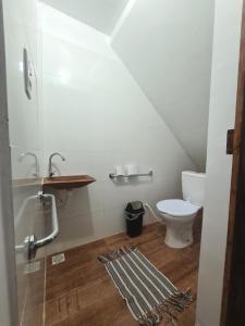 Ein Badezimmer in der Unterkunft Vila Shangri-la Algodoal- Suítes e Redário