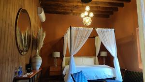 Postel nebo postele na pokoji v ubytování Bito's Hotel Boutique