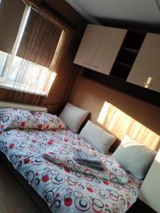 Ένα ή περισσότερα κρεβάτια σε δωμάτιο στο Simo&Dani