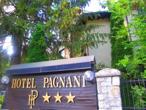 a sign for the hotel pajamont at Hotel Pagnani in Pescasseroli