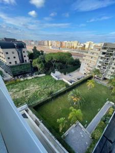 a view of a park in a city with buildings at Boulevard Suite in Bari