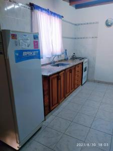 Kuchyň nebo kuchyňský kout v ubytování Cabañas Los Cerezos