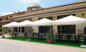 Restoran atau tempat lain untuk makan di Dominus Hotel