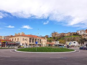 a roundabout in the middle of a city street at Hotel Faranda Express Alisas Santander in Santander