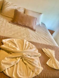 Posteľ alebo postele v izbe v ubytovaní Mirante Caraiva