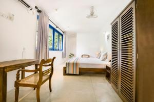 Letto o letti in una camera di Urchin Unawatuna